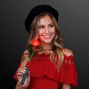 Woman displaying Red Light Up LED Rose