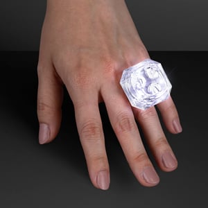 Hand model displaying White Light Up Princess Cut LED Ring