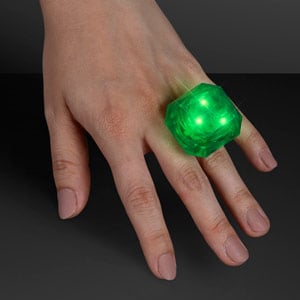 Hand model displaying LED Light Up Green Gem Ring