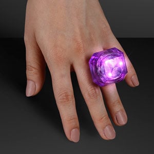 Hand model displaying Purple Lighted Gem Ring