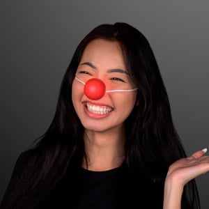 Woman displaying LED Light Up Blinking Red Clown Nose