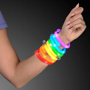 Hand model displaying Assorted Color LED Light Up Tube Bracelets