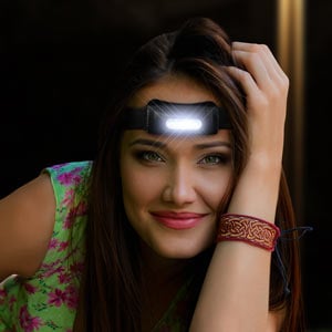 Female wearing LED Head Light Hands Free Light Up