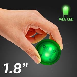 Hand displaying Green Light Up Impact Activated LED Ball