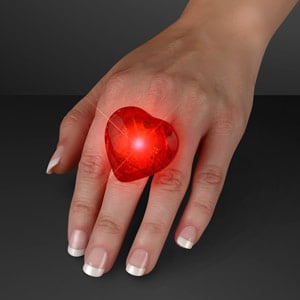 Hand model displaying Pulsing Light Red Heart LED Ring