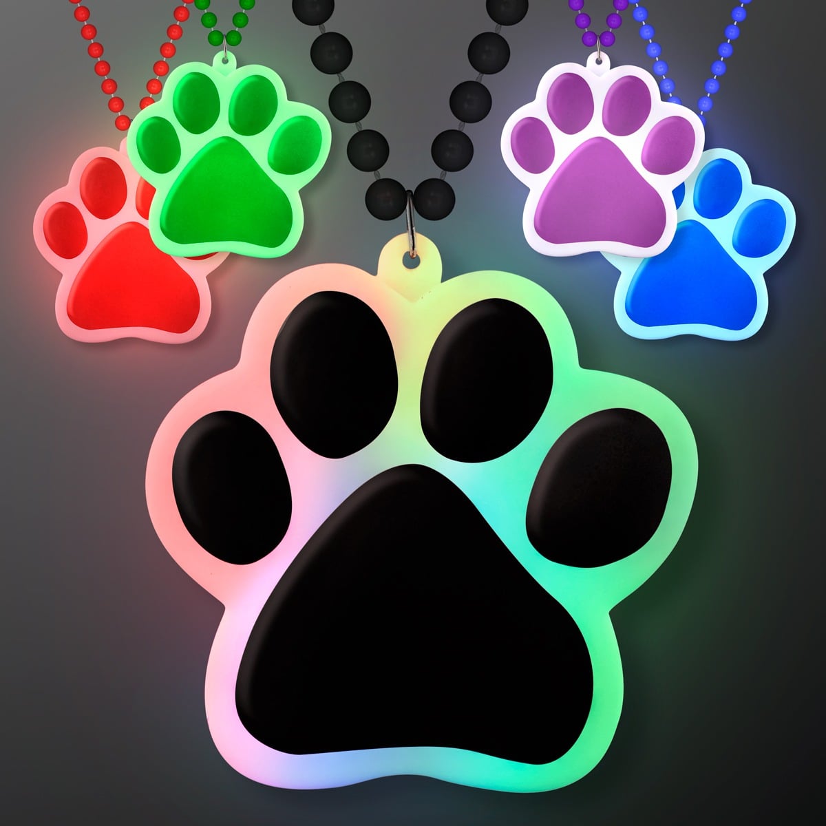 Four Light up Paw Print Charm Necklaces in red, green, purple, and blue glow on beaded chains against a dark background, with the largest charm in front showing a vibrant multicolored light effect.