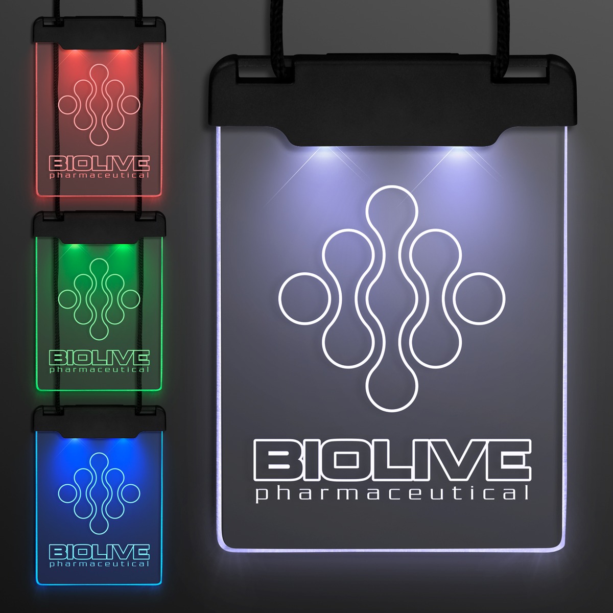 The Space Glow Light Badge Necklace features the BIOLIVE pharmaceutical logo with a molecular design, illuminated in red, green, and blue. Three smaller images on the left show each color; a larger image on the right displays the full badge.