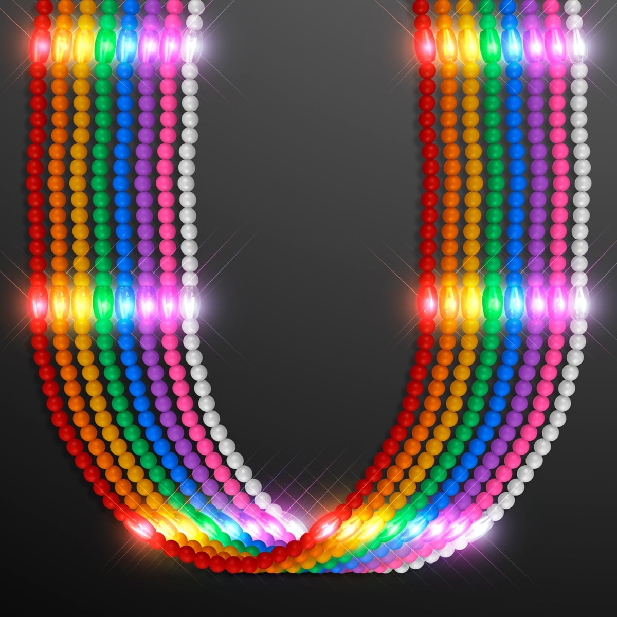 The Still-Light Beads No-Flash Necklace features multiple strands of shiny rainbow and white beads in a U-shape against a dark background, with sparkling light effects reflecting off each bead.