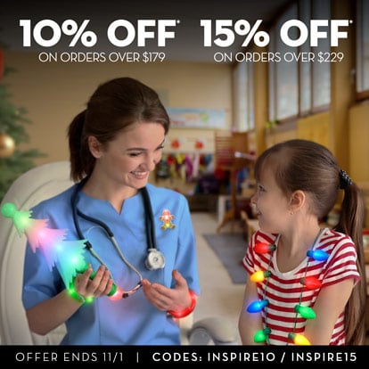 Nurse and a little girl playing with light up toys